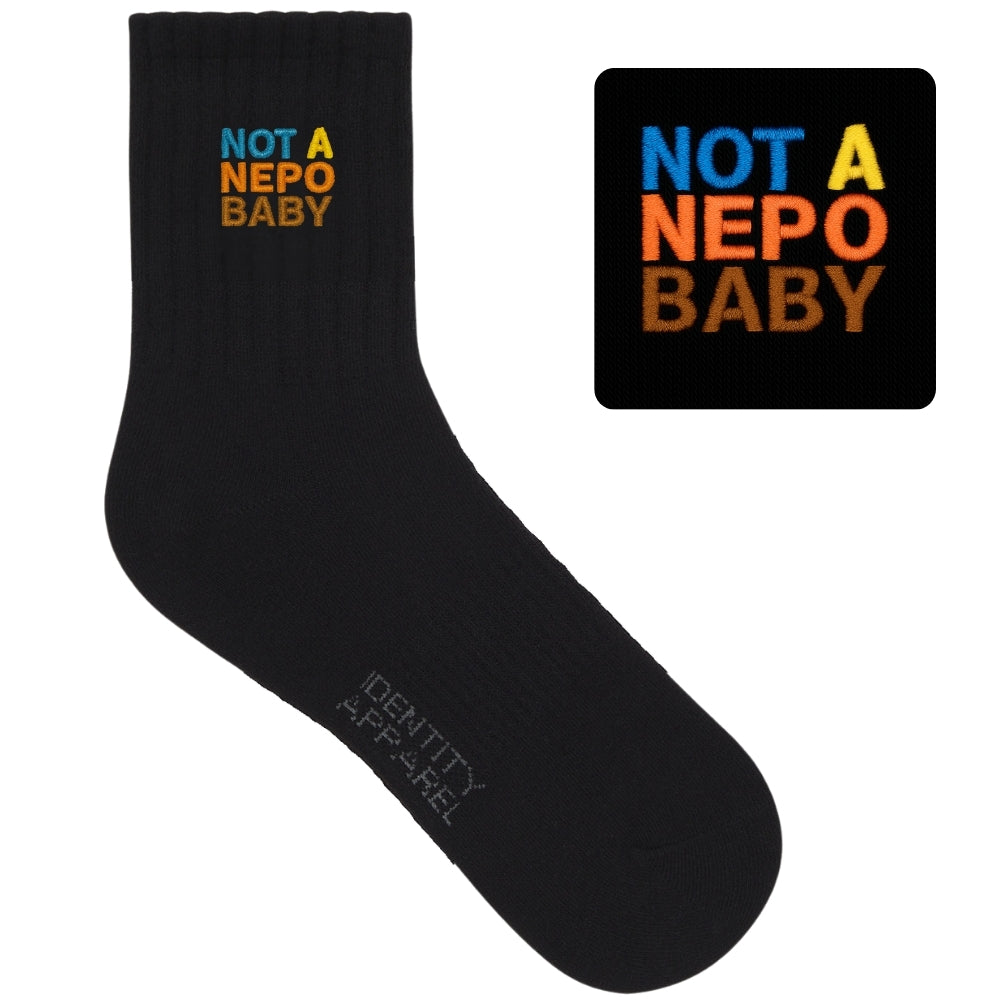 NOT A NEPO BABY Embroidered Political Statement Socks | Buwaya Collection